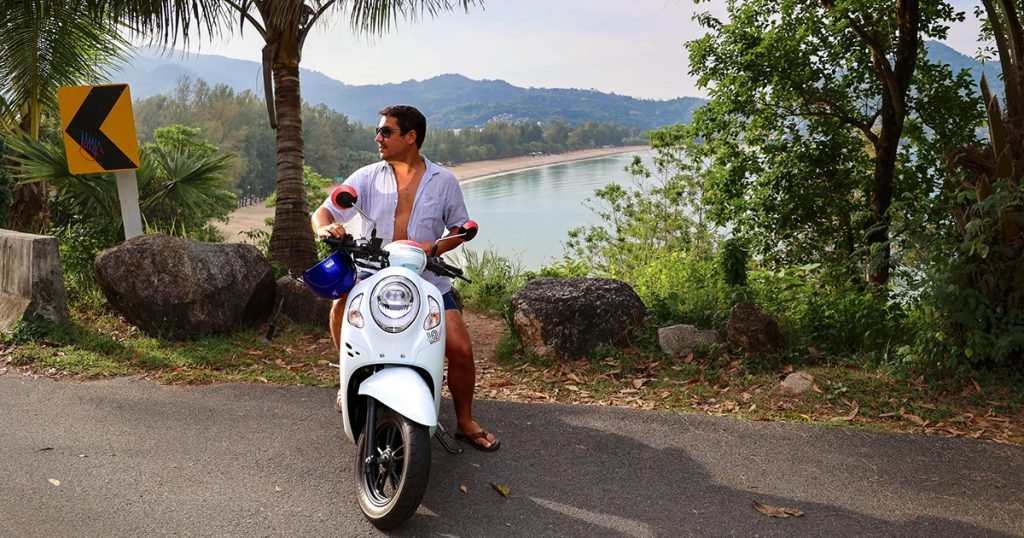 A tourist riding a motorbike in Phuket