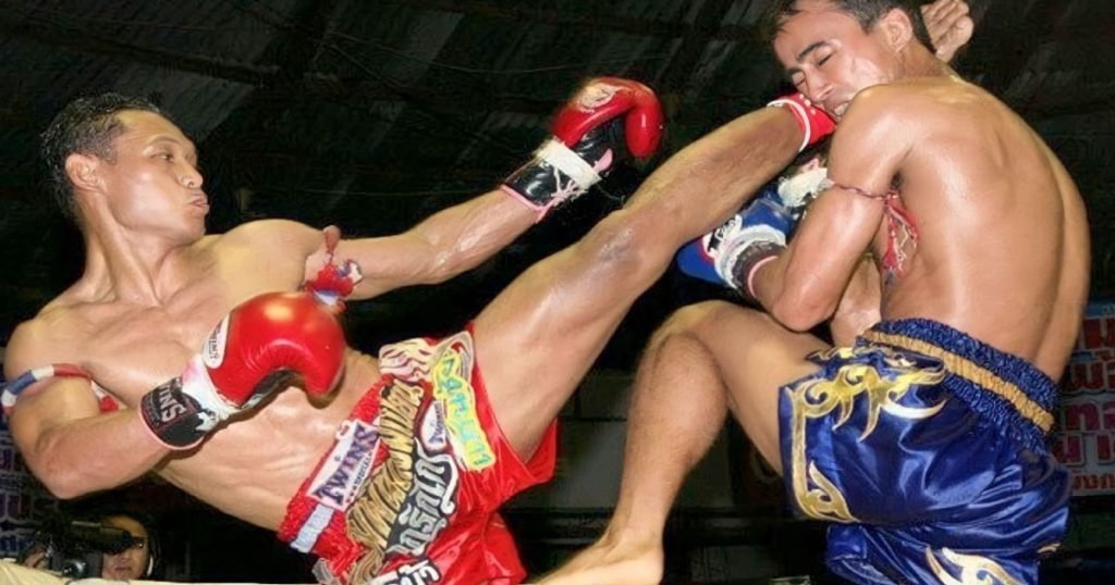 Saenchai delivering a high kick to an opponent
