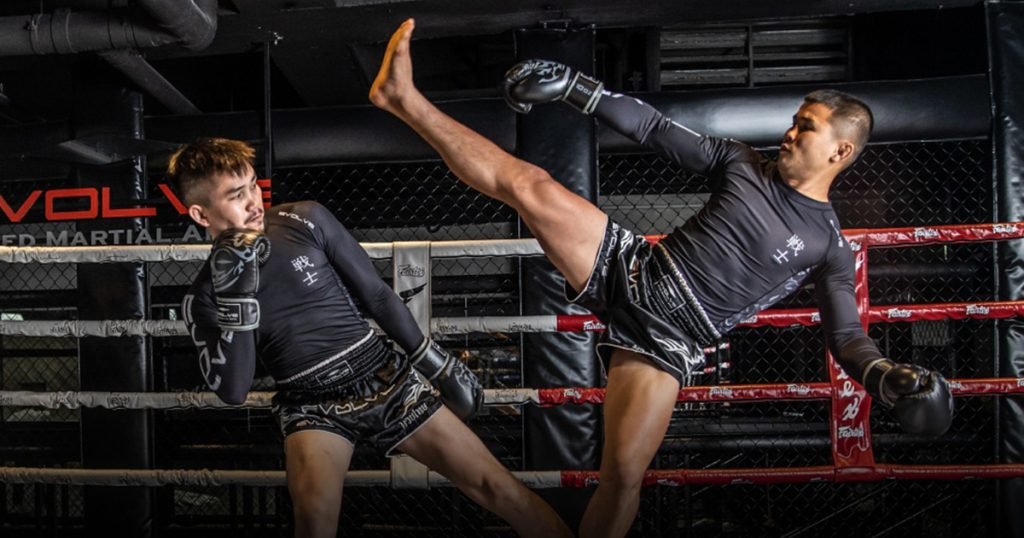 Two Muay Thai fighters practicing footwork